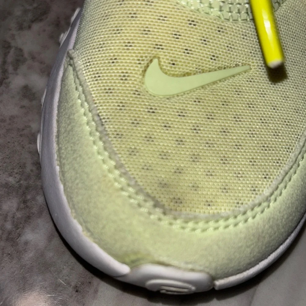 Nike Yellow and Blue React Sneakers Dynamic Design